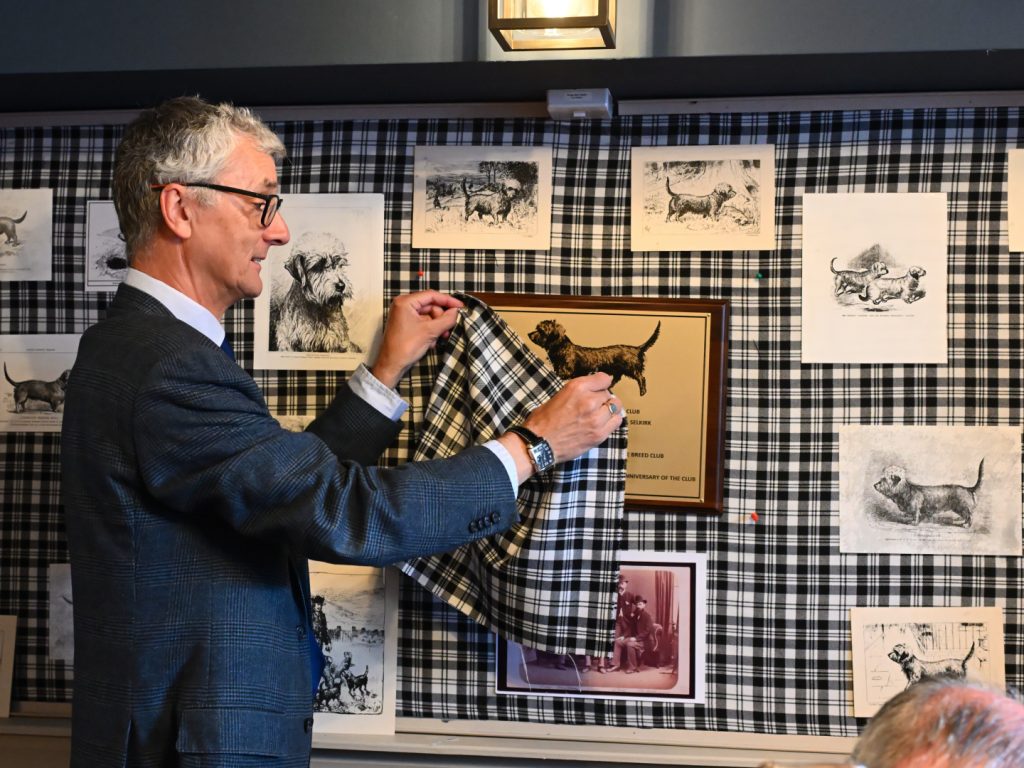 Paul Eardley unveils a plaque